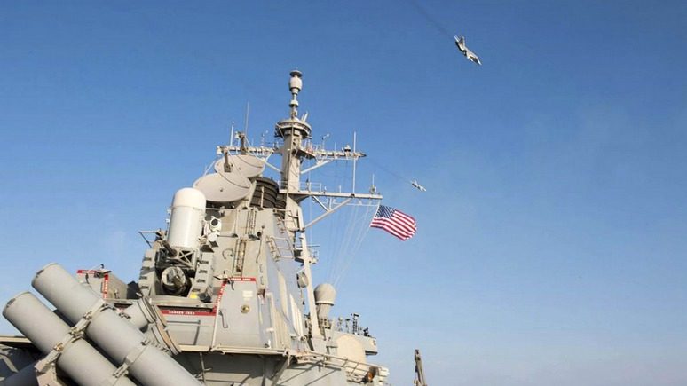 an-u-s-navy-picture-shows-what-appears-to-be-a-russian-sukhoi-su-24-attack-aircraft-flying-over-the-u-s-guided-missile-destroyer-uss-donald-cook-in-the-baltic-sea