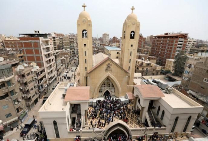 a-general-view-is-seen-as-egyptians-gather-by-a-coptic-church-that-was-bombed-on-sunday-in-tanta