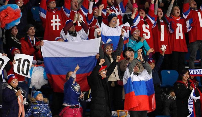 Русские наплевали на МОК и достали флаги РФ на всех трибунах