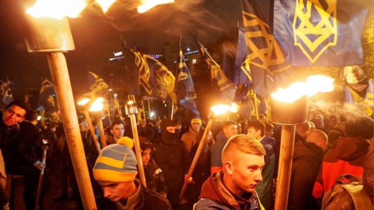 members-of-the-ukrainian-national-guard-azov-regiment-activists-of-the-azov-civil-corp-and-the-far-right-radical-group-right-sector-take-part-in-a-rally-to-mark-defender-of-ukraine-day-in-kiev